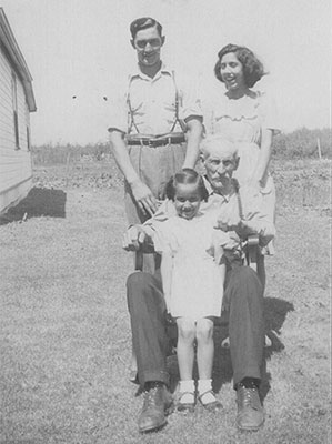 John, Evelyn and Beatrice Begg with Grandpa Robert