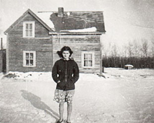 Arlene in front of the old Conrod House